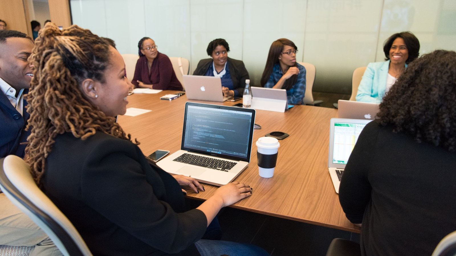 Business advisory planning session around a boardroom table